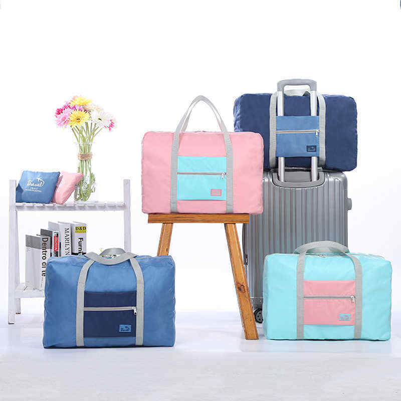 Korean-version-of-the-portable-clothing-luggage-bag-travel-storage-bag-waterproof-large-capacity-air-1454641