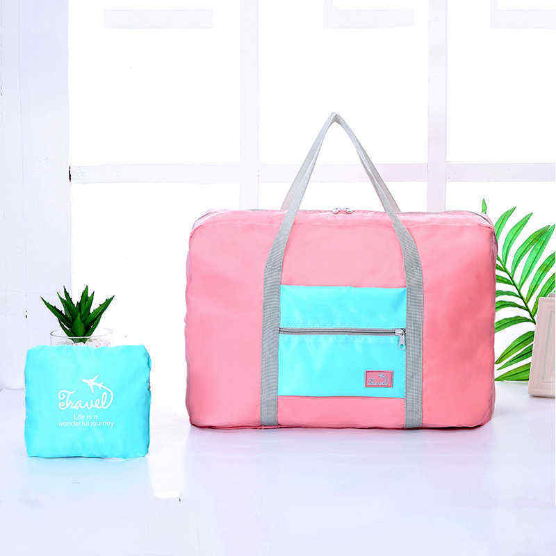 Korean-version-of-the-portable-clothing-luggage-bag-travel-storage-bag-waterproof-large-capacity-air-1454641