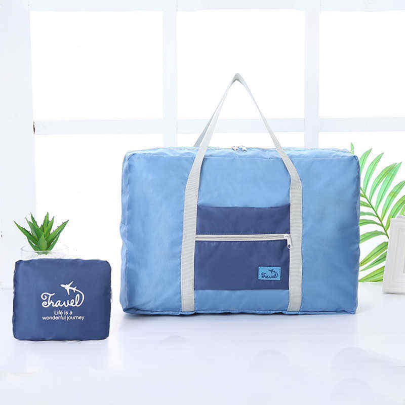Korean-version-of-the-portable-clothing-luggage-bag-travel-storage-bag-waterproof-large-capacity-air-1454641