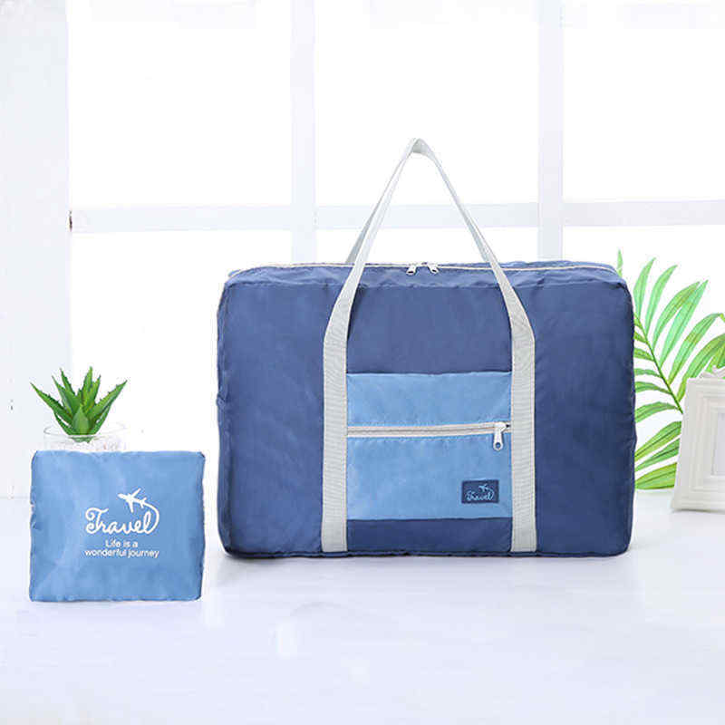 Korean-version-of-the-portable-clothing-luggage-bag-travel-storage-bag-waterproof-large-capacity-air-1454641