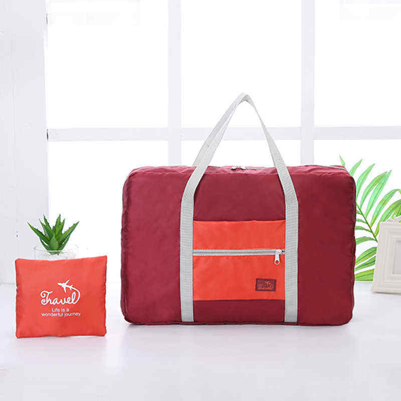 Korean-version-of-the-portable-clothing-luggage-bag-travel-storage-bag-waterproof-large-capacity-air-1454641