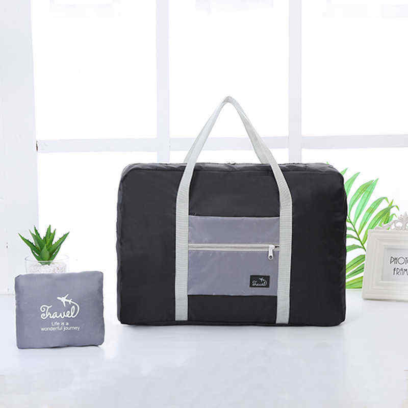 Korean-version-of-the-portable-clothing-luggage-bag-travel-storage-bag-waterproof-large-capacity-air-1454641