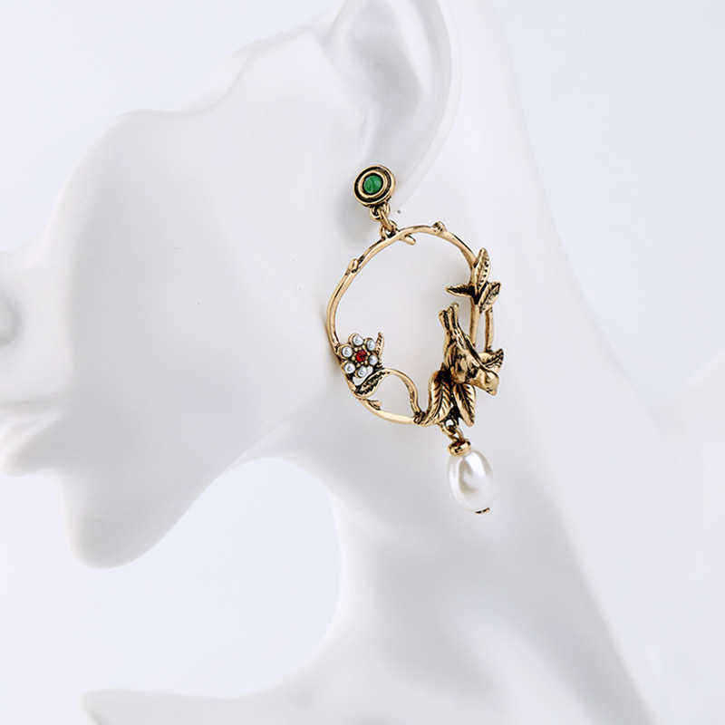 Trendy-Vivid-Pearl-Earrings-with-Bird-on-The-Tree-Irregular-Hoop-Gold-Earring-for-Women-1260011